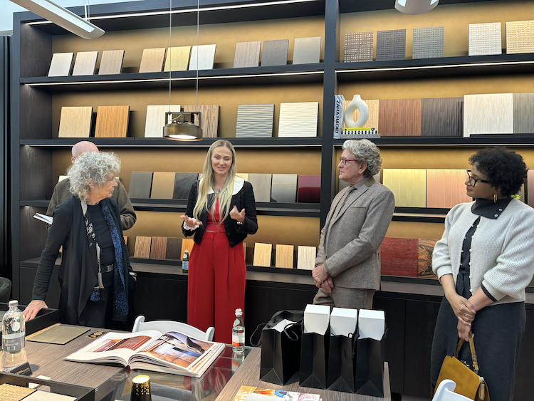 Materia Collection founder Yana Pojidaeva addresses designers in the new showroom